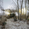 Штурмова бригада підрозділу «Азов» веде вогонь із гаубиці 2А65 «Мста-Б» на околицях Бахмута. Україна, 6 лютого 2023 року. Фото: Reuters