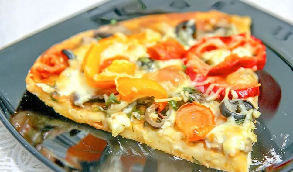 Піца на кефірному тісті — надзвичайно простий рецепт Фото: Максим Нікітін