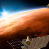 Здвоєний космічний апарат Mars Cube One (MarCO), що пролітає над Марсом із Землею та Сонцем вдалині. Зображення: NASA/JPL-Caltech via AP